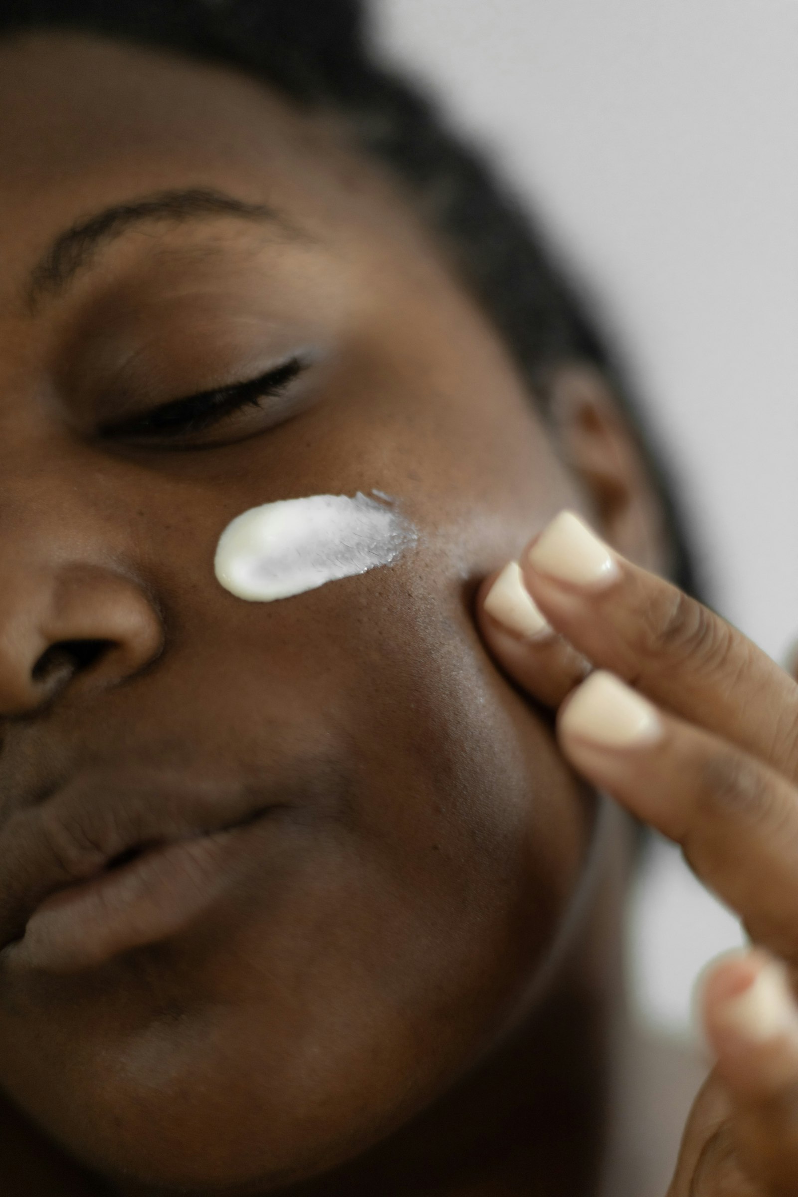 A close-up skincare consultation